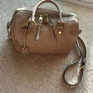 LOUIS VUITTON
Empreinte Speedy Bandouliere 25 Dune pre loved